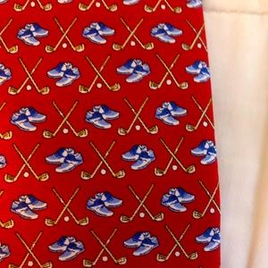 Red golf club and shoes tie